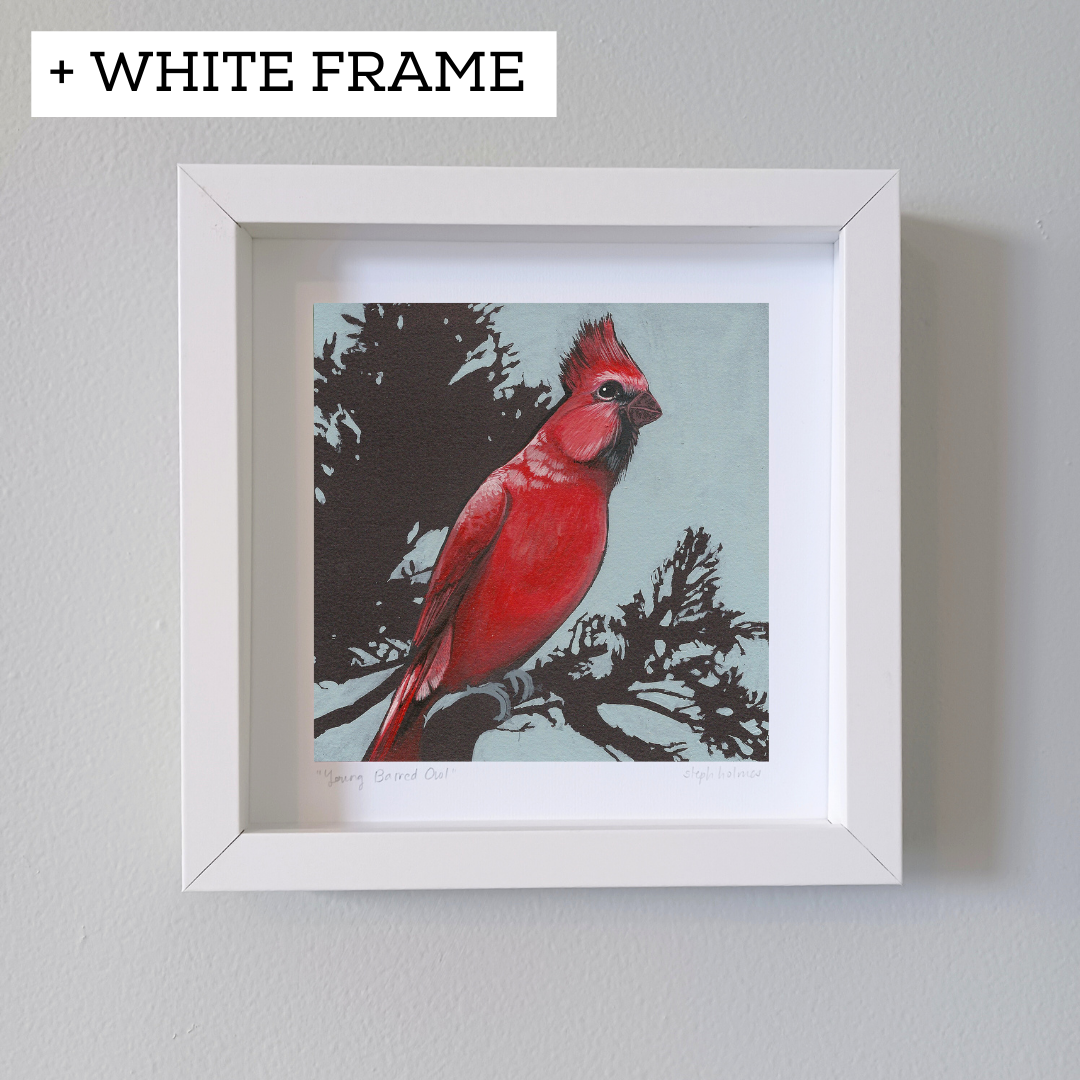 An art print of a red northern cardinal sitting on a branch.